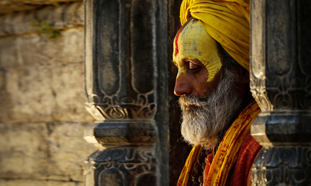 KATHMANDU, -MARCH25 2017 Yogi sitting in prayer in Pashupatinath Temple Nepal of Kathmandu